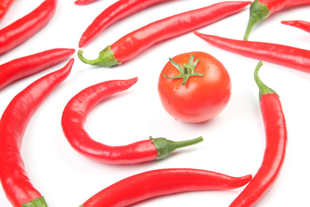 火辣红辣椒和白番茄背景.维生素蔬菜食品食物配料烹饪