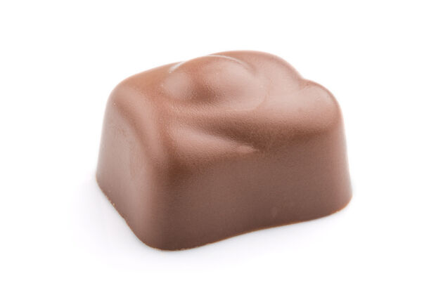 有机一块巧克力糖孤立在白色表面奶油不同健康