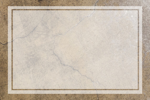 土色调一个古老的棕色混凝土墙上的空白透明框架地板装饰大理石