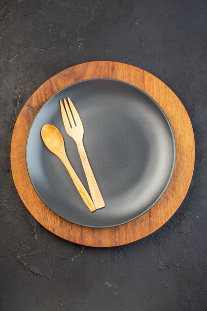 食物木勺和叉子的垂直视图 黑色的 棕色的 黑色的 黑色的搅拌碗碗容器
