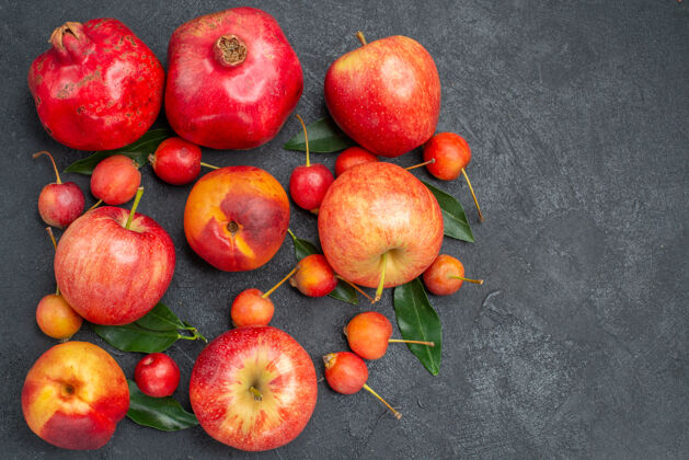水果顶部特写查看水果开胃苹果樱桃蜜桃石榴健康樱桃多汁