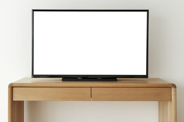 最小木桌上的白色智能电视屏幕创新白色屏幕数字设备