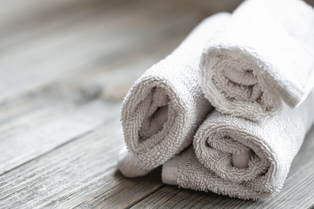 滚动背景模糊的卷浴巾特写健康和个人卫生概念特写毛巾健康