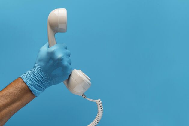 连接带手套的手持电话接收器 带复印空间联系人传送通信