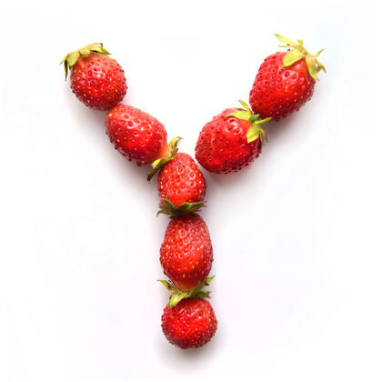 团体白色背景上红色新鲜草莓的英文字母y字母表字体叶子