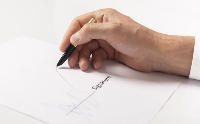签名商人手签合同特写合同手表格