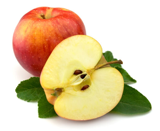 水果多汁的红苹果 白苹果上有叶子吃叶子食物