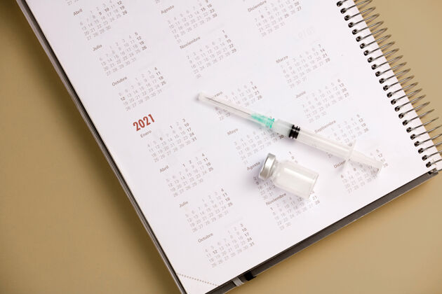 针带日历的注射器和疫苗日月疫苗