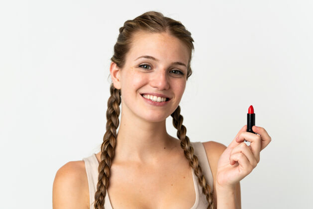 年轻年轻的白种女人在白色的红色唇膏上孤立女性脸时尚