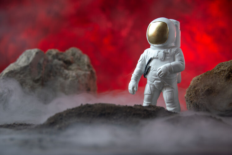 运动前视图白色宇航员与月球上的岩石红色幻想科幻宇宙幻想运动员宇宙