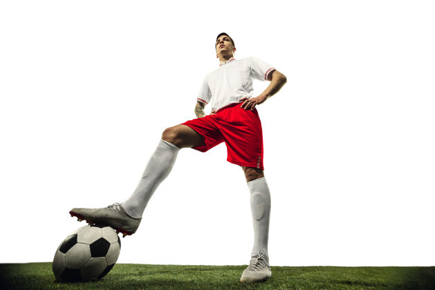 年轻白色背景上的足球或足球运动员动作活动概念人人休闲