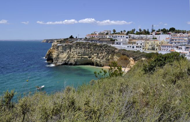 城市美丽的拍摄一个沿海城市阿尔加夫在葡萄牙海滩悬崖大西洋