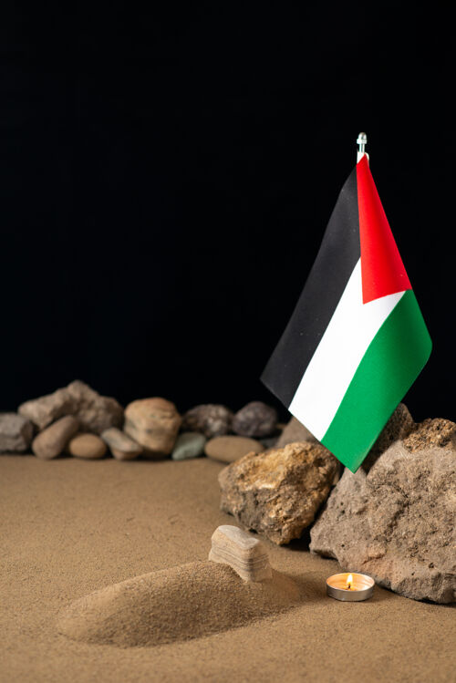 死亡黑面上有石头的巴勒斯坦国旗国家符号石头