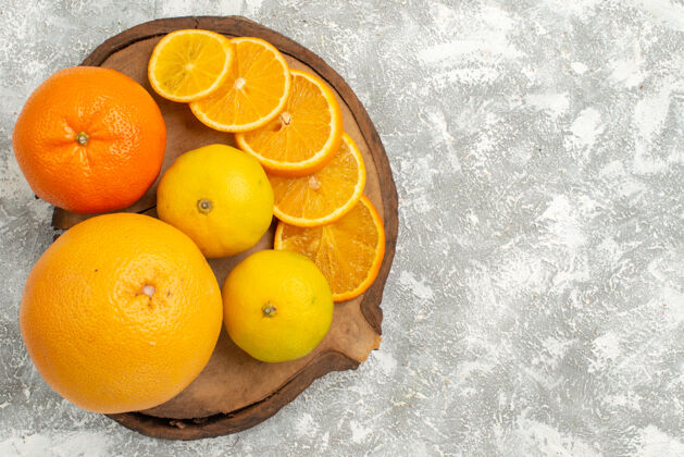水果顶视新鲜的橘子与橘子的白色背景柑橘异国情调的热带新鲜水果背景热带顶部