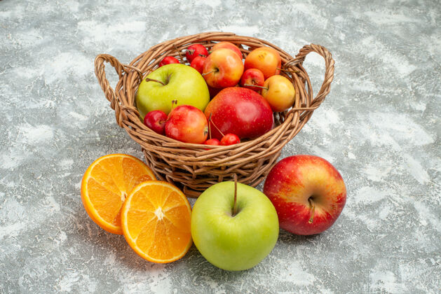 饮食前视图水果组成不同的新鲜水果篮子内的白色空间前内健康