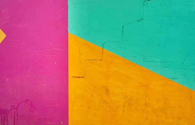 垃圾墙上的抽象细节和彩色涂鸦碎片文化喷雾碎片