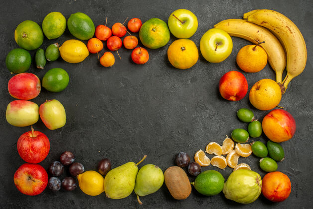 水果顶视图水果组成新鲜水果的灰色背景苹果健康食用水果