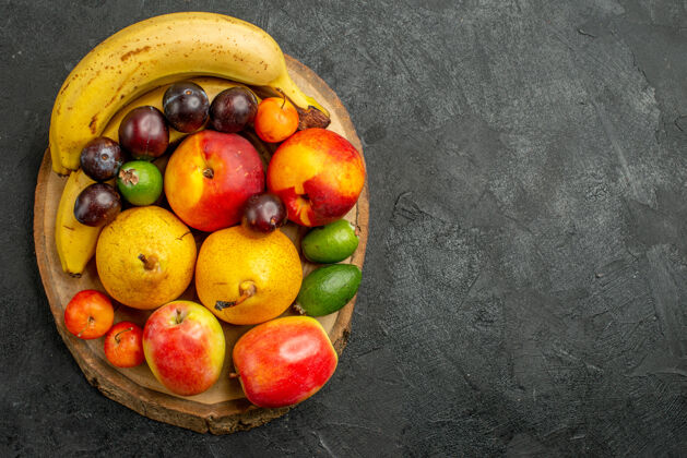饮食顶视图水果组成深灰色背景上的新鲜水果新鲜健康桃