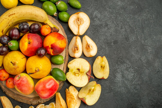 健康顶视图水果组成一个灰色背景上的新鲜水果水果成熟多