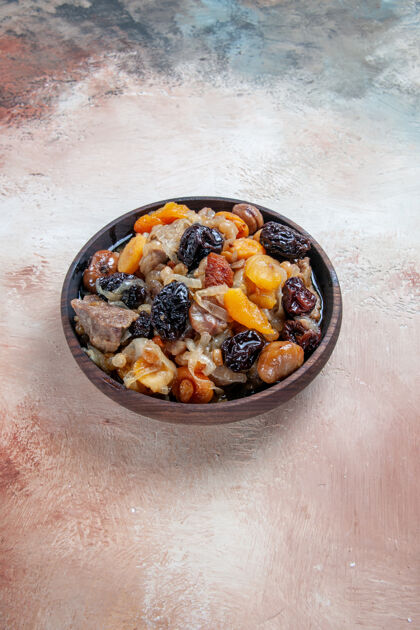 胡椒一份开胃的米饭 碗里有干果和栗子食物肉饭午餐