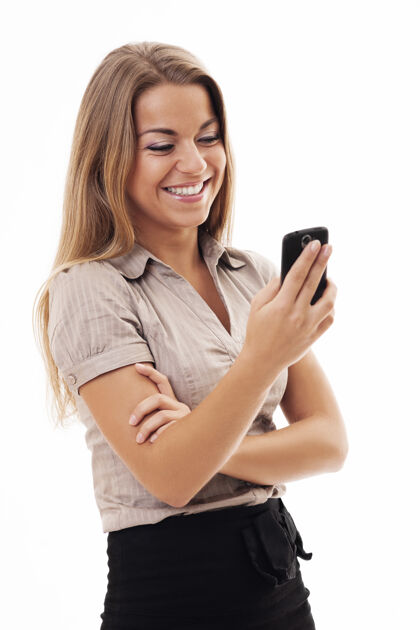 持有快乐的女商人用手机发短信成人专业职业电话