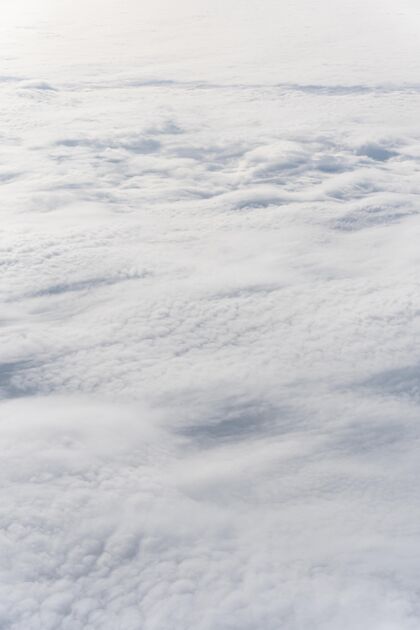 自由从飞机上看到美丽的蓬松的云多云云景天气