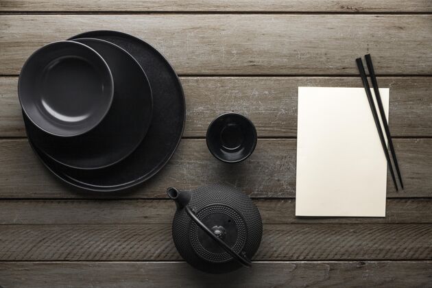 顶视图带餐具和筷子的茶壶俯视图顶视图平铺茶壶