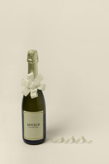 饮料带蝴蝶结的高视角香槟瓶模型饮料事件葡萄酒