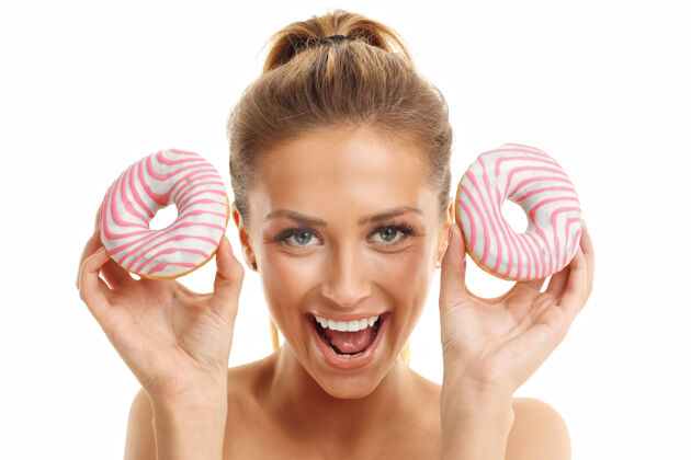 甜点在白色背景上摆着甜甜圈的成年女人甜甜圈饮食思考